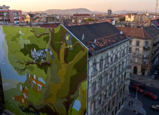 Farbenfroher Comic auf Gebäude im VIII. Bezirk in der Baross Straße